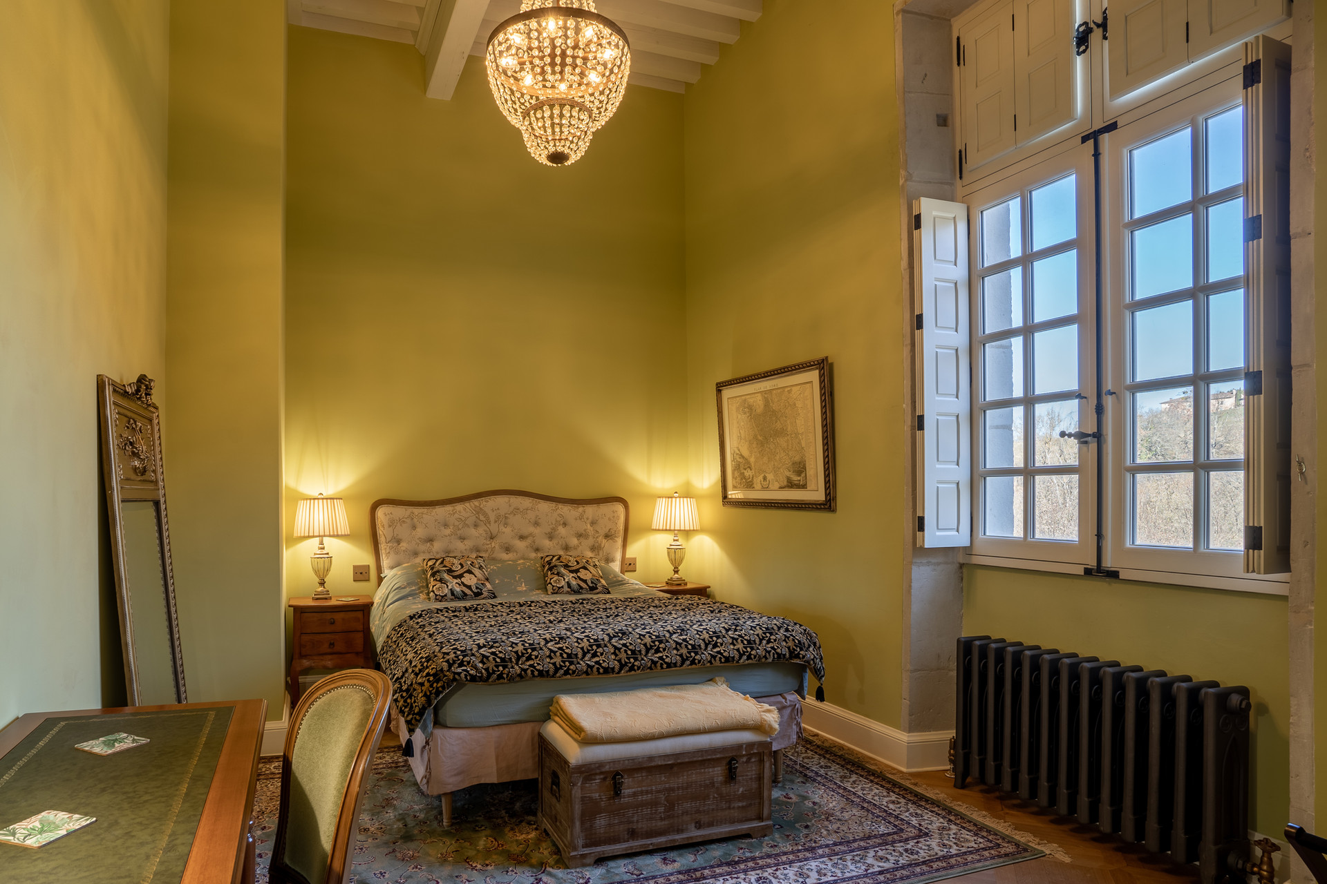 Bedroom with period chandelier